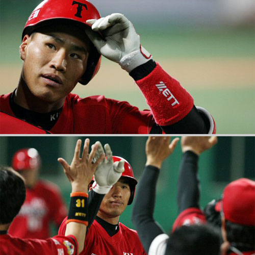   7일 오후 서울 목동야구장에서 열린 히어로즈와 KIA의 경기에서 5회초 1사 KIA 김상현이 만루홈런을 친 뒤 열광하는 팬들과.. 동료들과 기뻐하고 있다. 