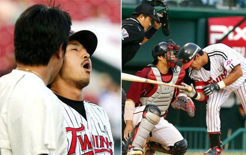 25일 서울 잠실야구장에서 열린 2009 프로야구 LG와 히어로즈의 경기에서 3회말 첫타자로 나선 LG의 박용택이 상대 투수 장원삼이 던진 공에 등을 맞아 괴로워 하고 있다. 