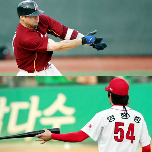 26일 광주 무등경기장에서 열린 2009 프로야구 KIA와 히어로즈의 경기에서 2회초 히어로즈 4번 브룸바가 안타를 때리고 놓친 방망이를 KIA 선발투수 양현종이 집어들고 있다. 